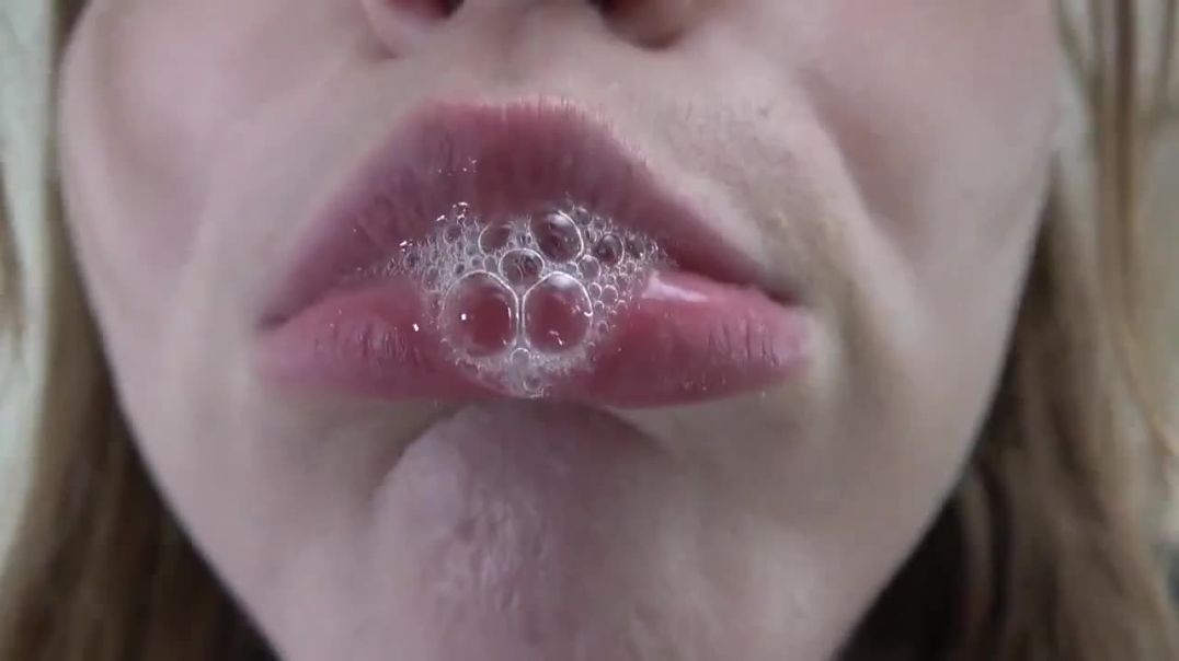 Blonde girl spitting/licking CAM